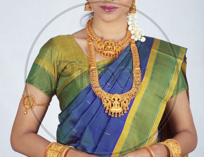 Traditional Indian Female/Woman Model in Blue Saree, green Blouse - Smiling