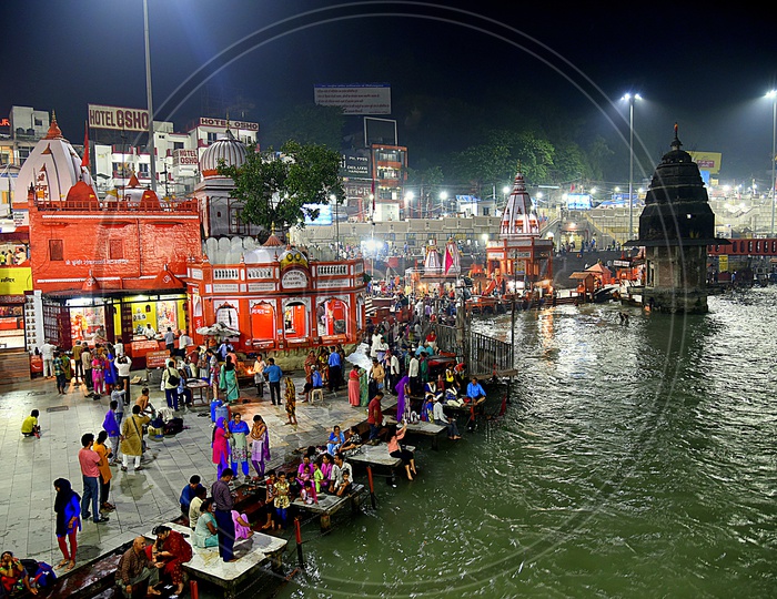 Indian Hindu Devotees at the Bank Of river ganges and Waiting For the Holy Aarthi / Harathi in Haridwar