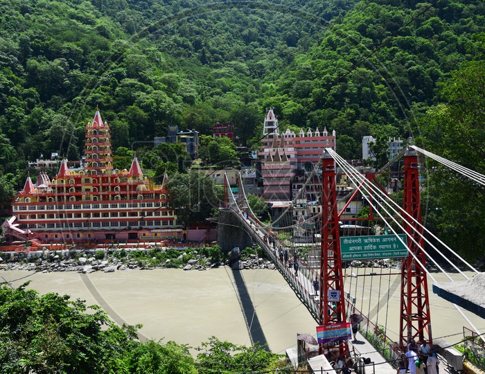A View Of Lakshman Bridge and Trayambakeshwar Temple In Rishikesh