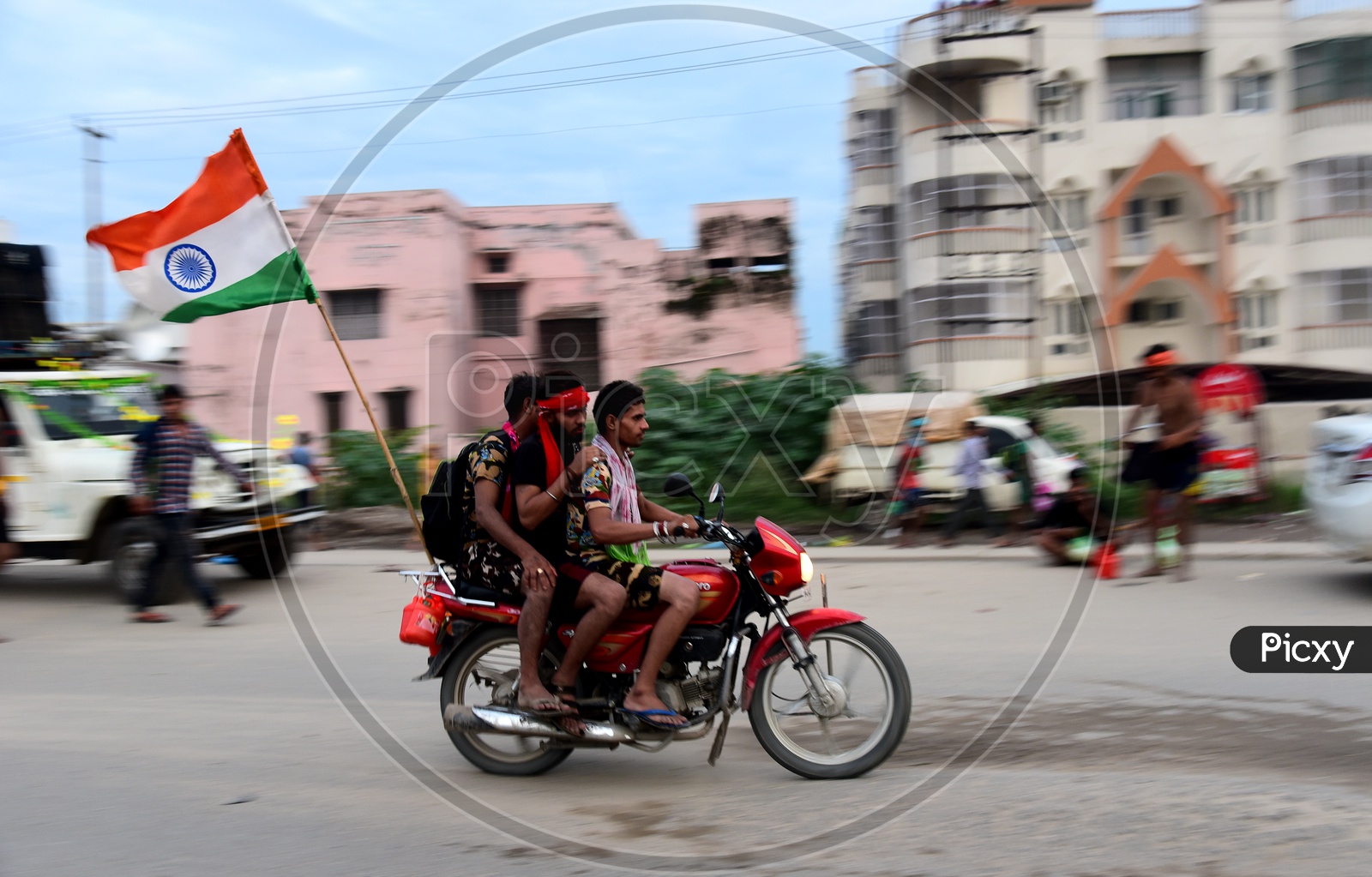 Pilgrims Travelling By Bikes With Indian Flag in Haridwar