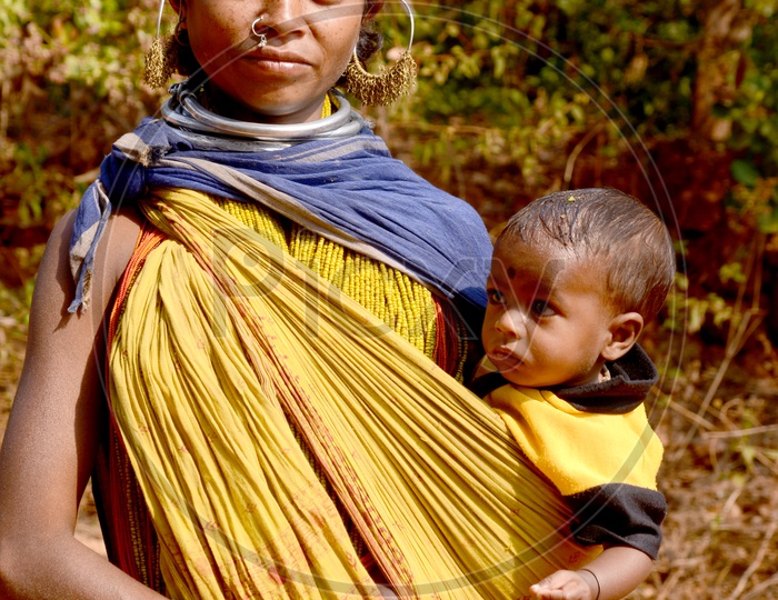 Portrait of Indian tribal Woman with Her Child In Puri , Odisha