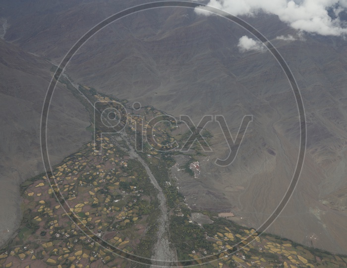 Aerila Views Of Villages and Valleys in Leh Shot From Flight Window