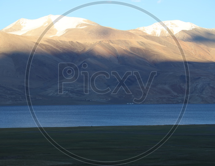 Beautiful Landscape of Snow Capped Mountains from leh with river in the foreground
