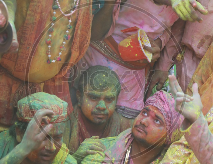 People celebrating Holi in streets of  Barsana,Uttar Pradesh, India