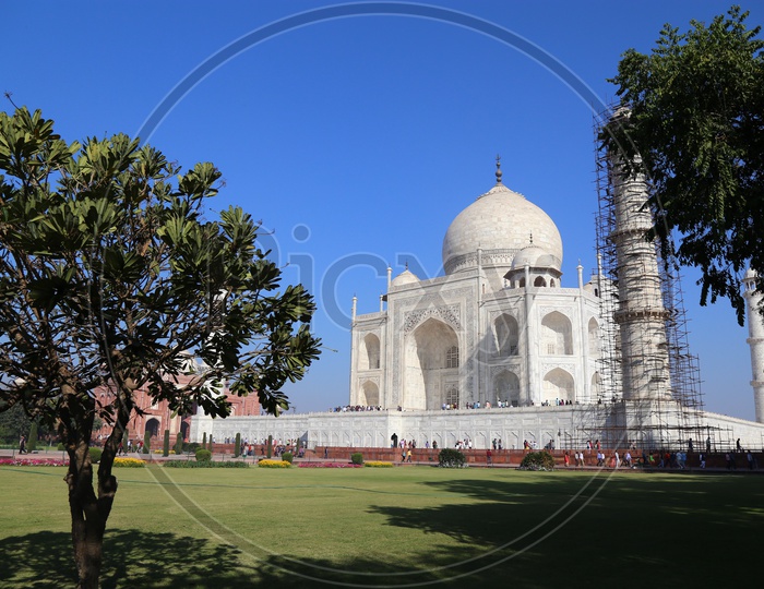 A Beautiful Composition Shot Of Taj Mahal With Blue Sky In Background