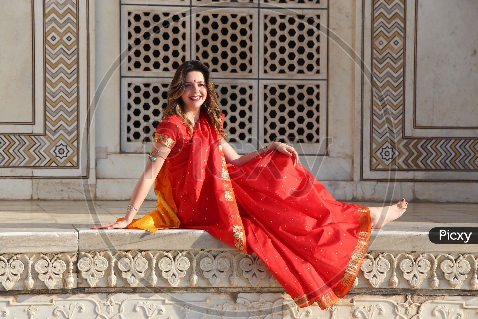 A Foreigner Lady In Traditional Indian Attire at Taj Mahal