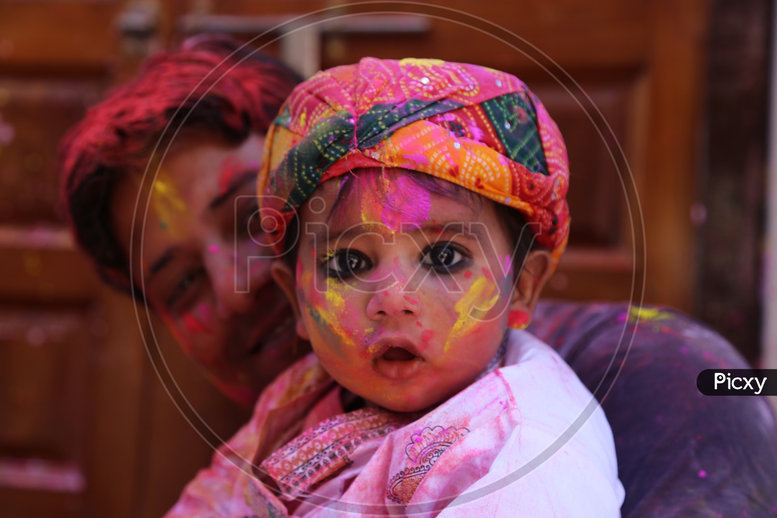 Baby boy with Colors/Colours on face - Holi/Indian Festival - Festival of Colors