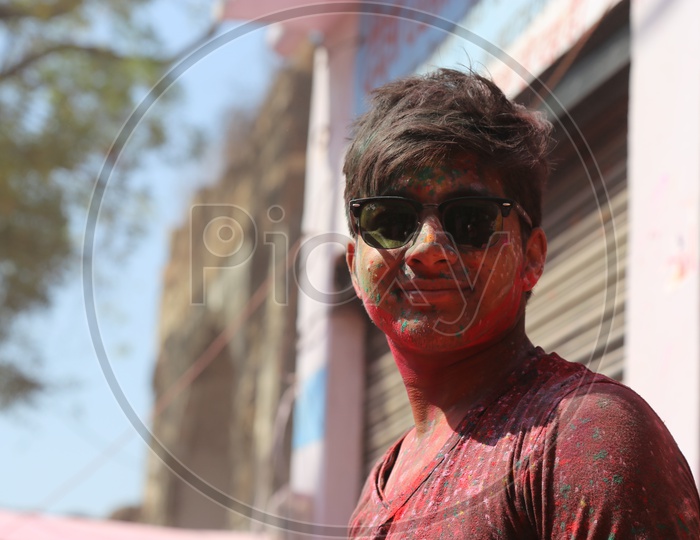 Man with Colors/Colours on face - Holi/Indian Festival - Festival of Colors