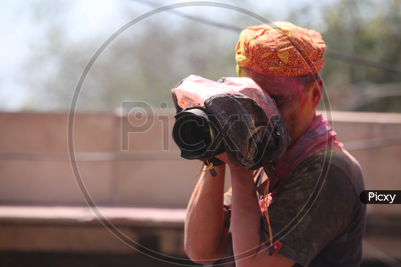 Photographer Capturing photos in Barsana Holi celebrations