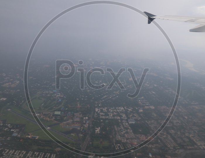 aerial view of smog covered  Delhi through flight window