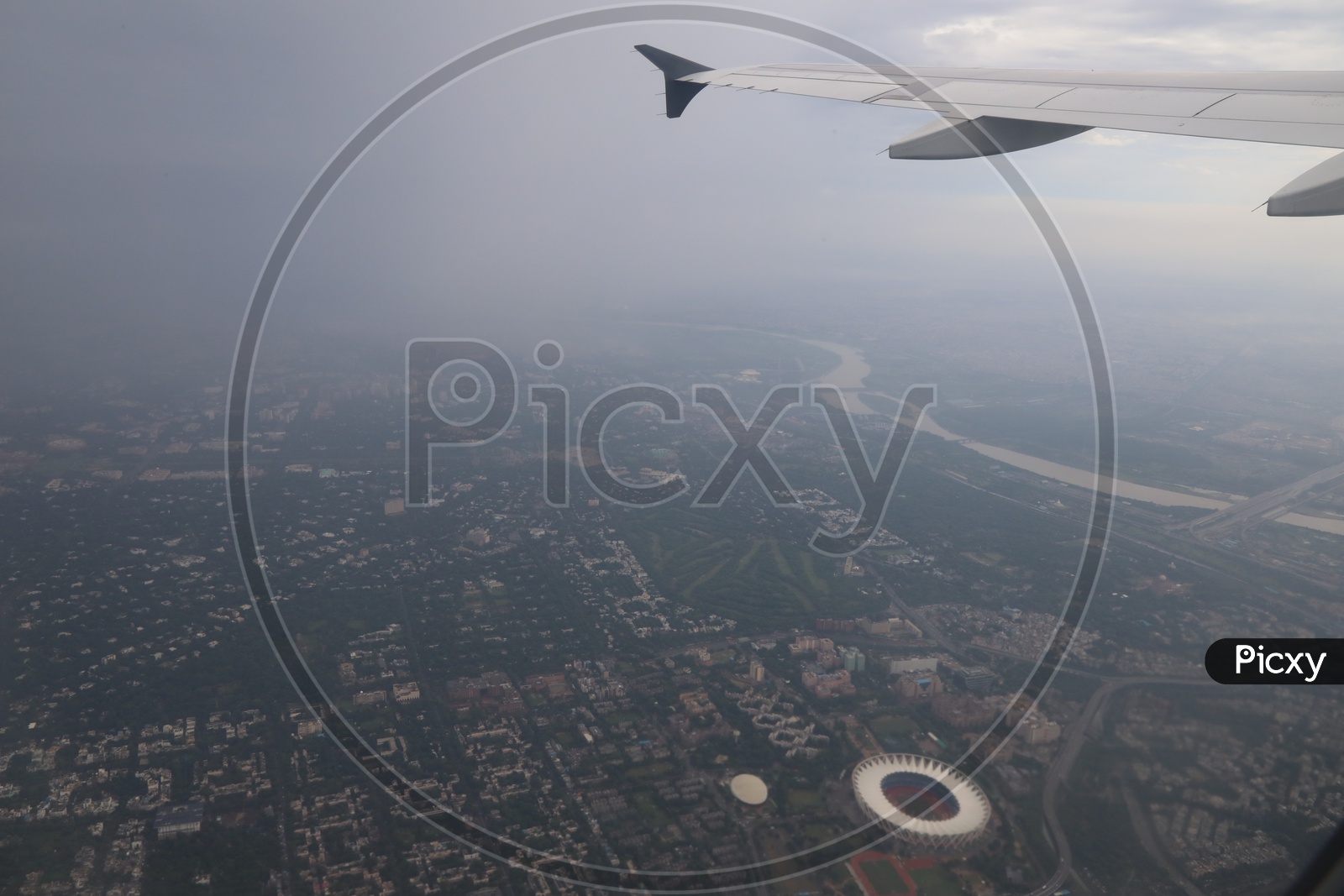 aerial view of smog covered  Delhi through flight window