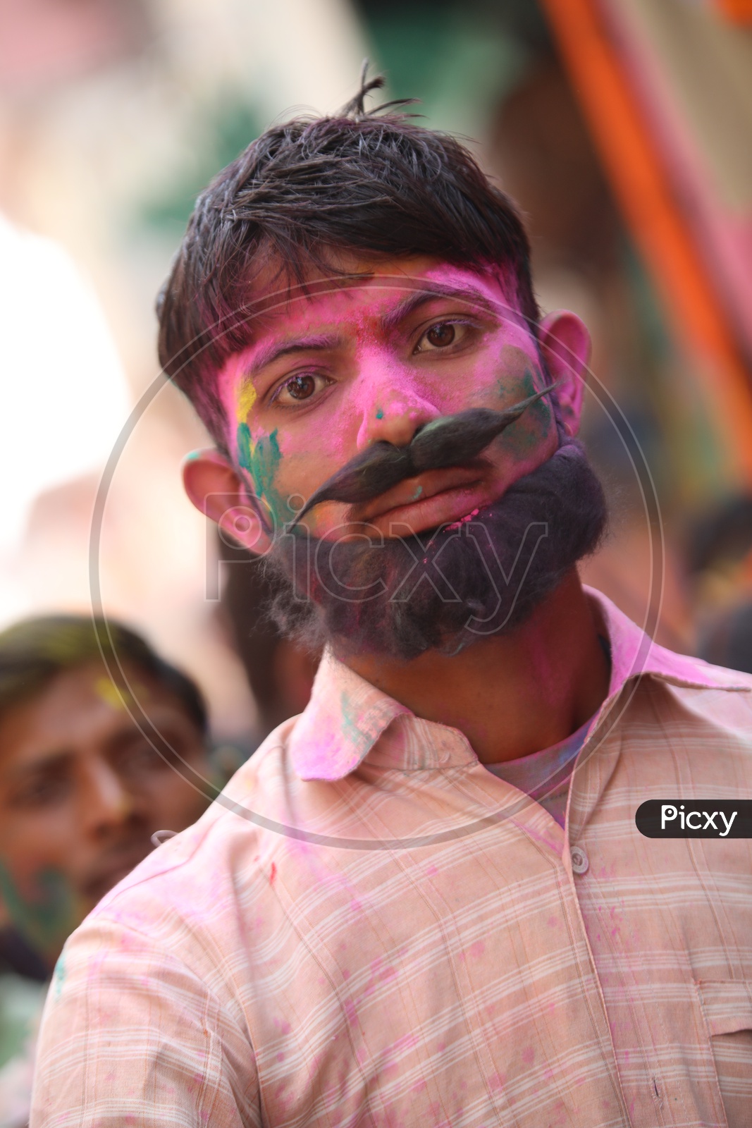 Portrait of a coloured face from Barsana holi celebrations