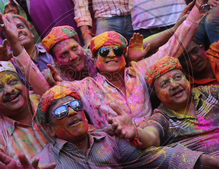 People celebrating Holi in streets of Barsana