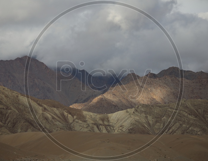 A Beautiful View Of Mountains in Leh With Sand Dunes and Valleys