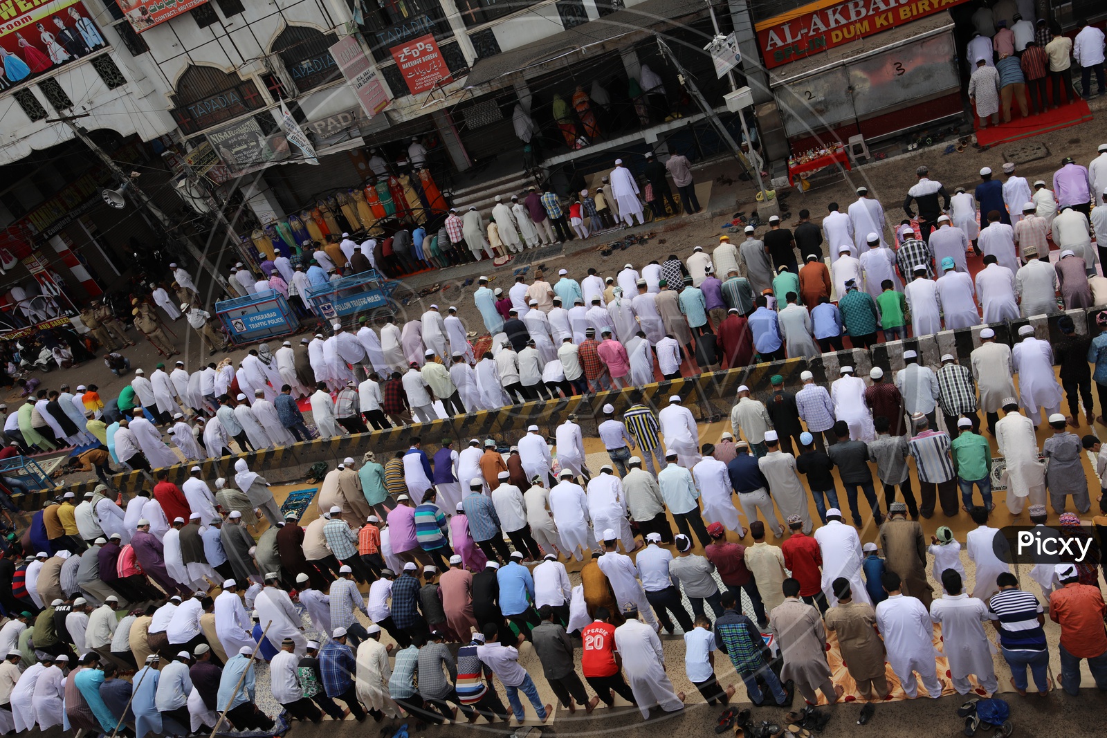 People doing Namaz in Charminar Streets
