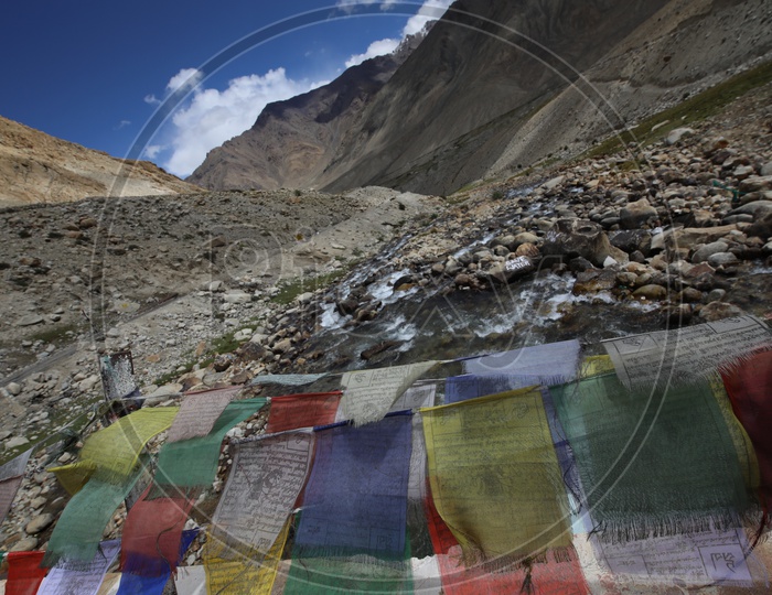 River valleys In Leh With Tibetan Flags In Fore ground and Valley View In Background
