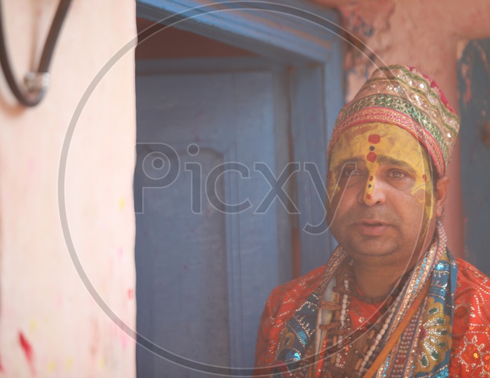 Portrait of a man in  Holi Celebrations in Barsana