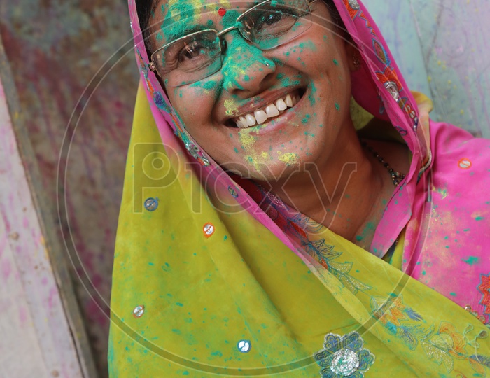 Woman Colors/Colours on face - Holi/Indian Festival - Festival of Colors