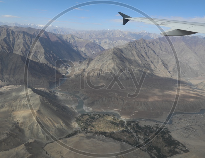 A Beautiful Aerial Views Of River Valleys  of leh From Flight Windows