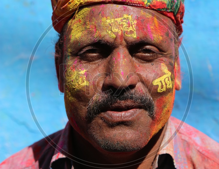 Portrait of coloured face from Holi Celebrations in Barsana