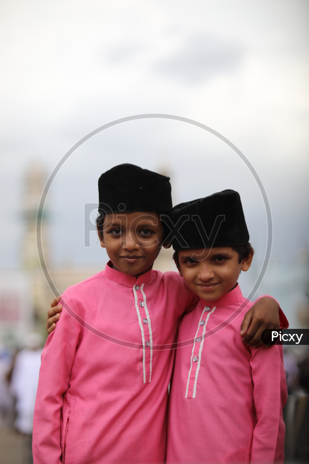 Portrait of muslim kids with pink dress from streets of Hyderabad