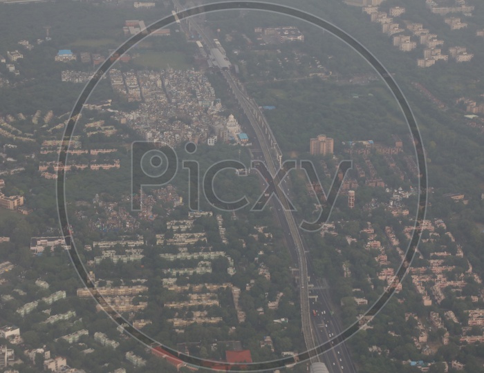 aerial view of smog covered Delhi through flight window