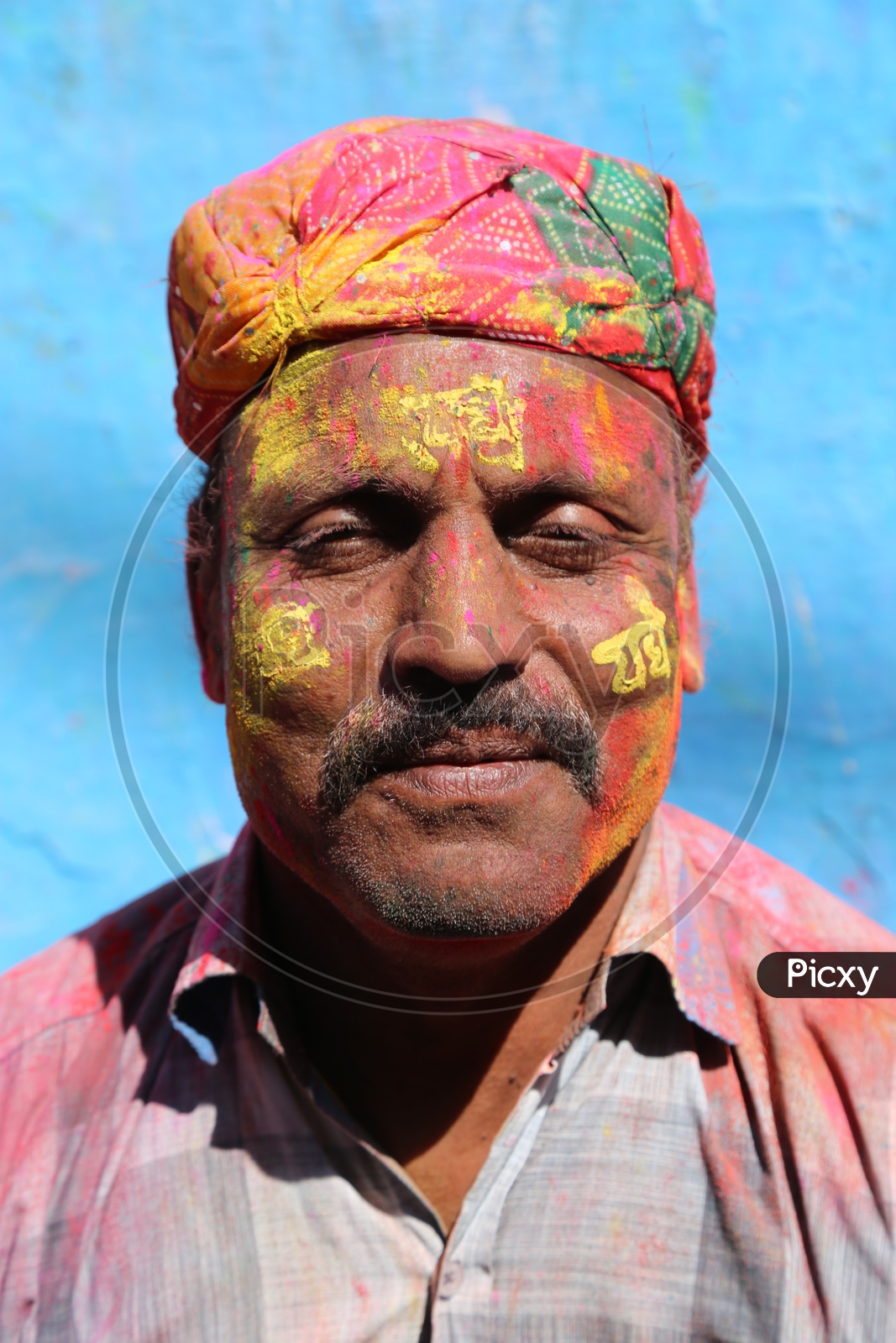 Portrait of coloured face from Holi Celebrations in Barsana
