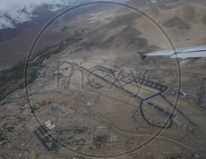 Leh Airport in aerial view from flight window
