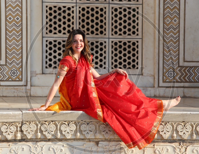 A Foreigner Lady In Traditional Indian Attire at Taj Mahal