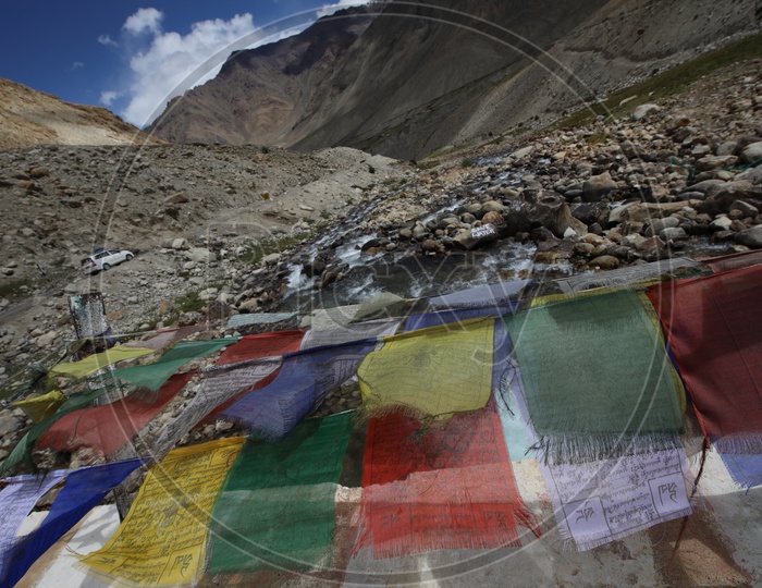 River valleys In Leh With Tibetan Flags In Fore ground and Valley View In Background
