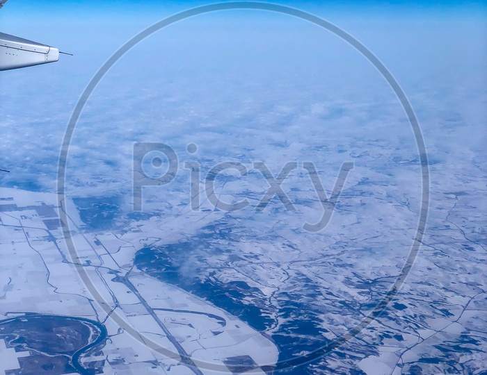 Ariel View of Snow Capped Mountains
