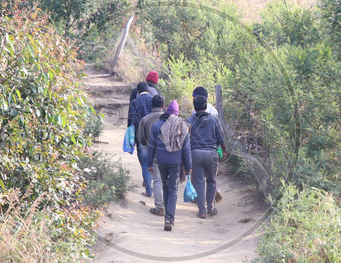 People On The pathways of Munnar