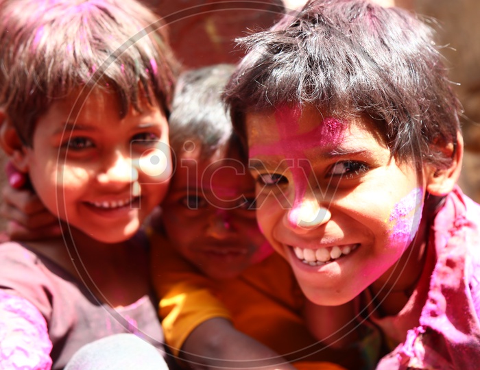 Children Celebrating Holi Festival in Nandgaon