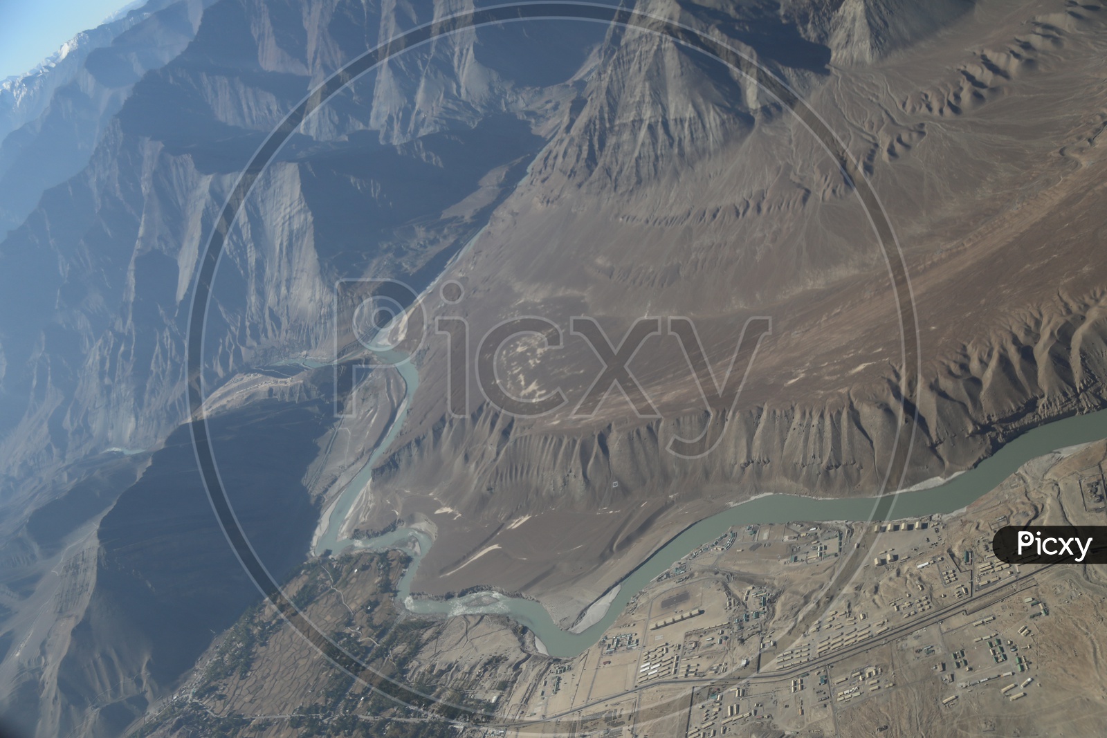 An Aerial View Of River Valleys In Leh shot From Flight Window
