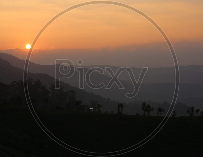 A Beautiful Sunset Over The Tea Plantations In Munnar
