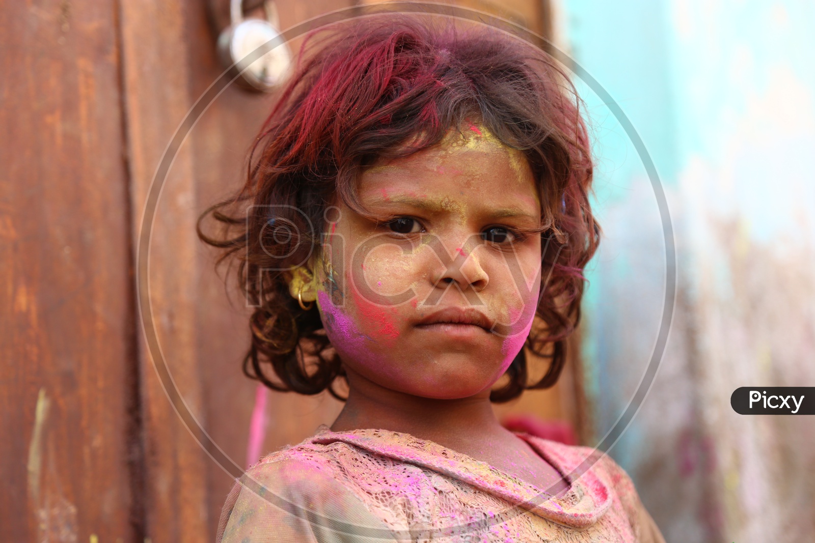 Boy with Colors on face - Holi Celebrations - Indian Festival - Colors/Colorful at Nandagaon