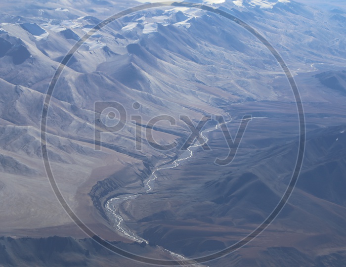 Aerial View Of River Valleys In Leh Shot From flight Window