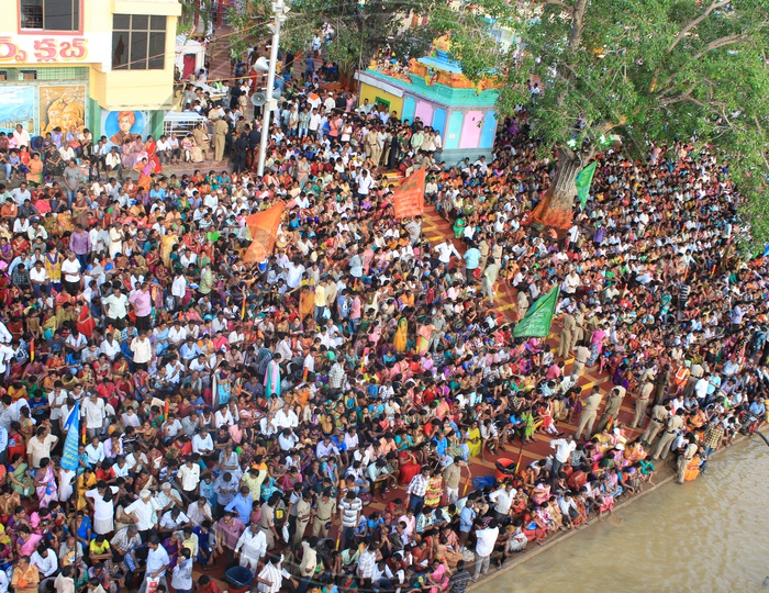Aerial View Of Hindu Pilgrims Watching The Holy Harathi / aarti Of Godavari River in Rajahmundry