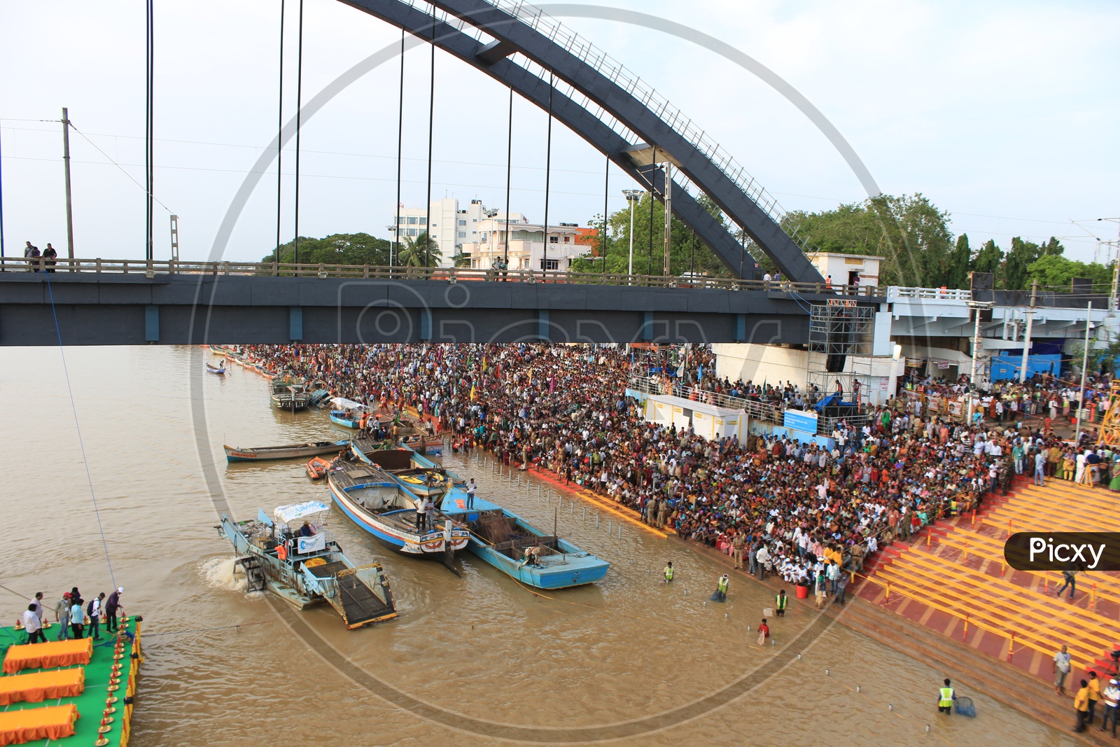 Aerial View Of Pilgrims Watching The Holy Haarathi / Aarti of Godavari river in Rajahmundry