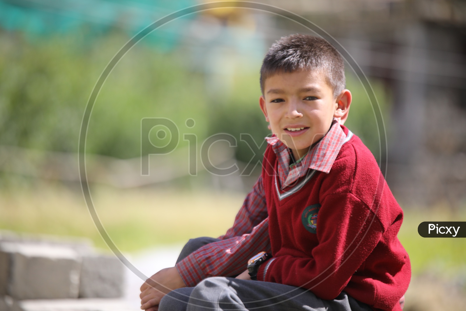 school kid from leh posing towards the camera