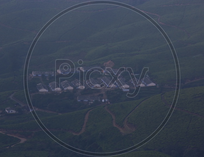 A Beautiful Aerial Shot Of Tea Factories in Munnar Valleys