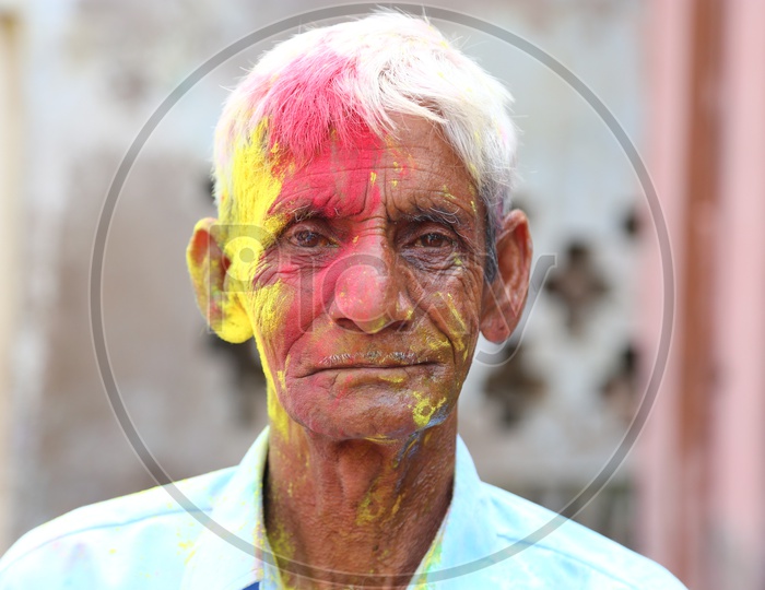 Old Man Celebrating Holi Festival in Nandgaon