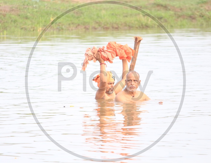 Indian Hindu Pilgrims Performing Holy Bath In river Godavari