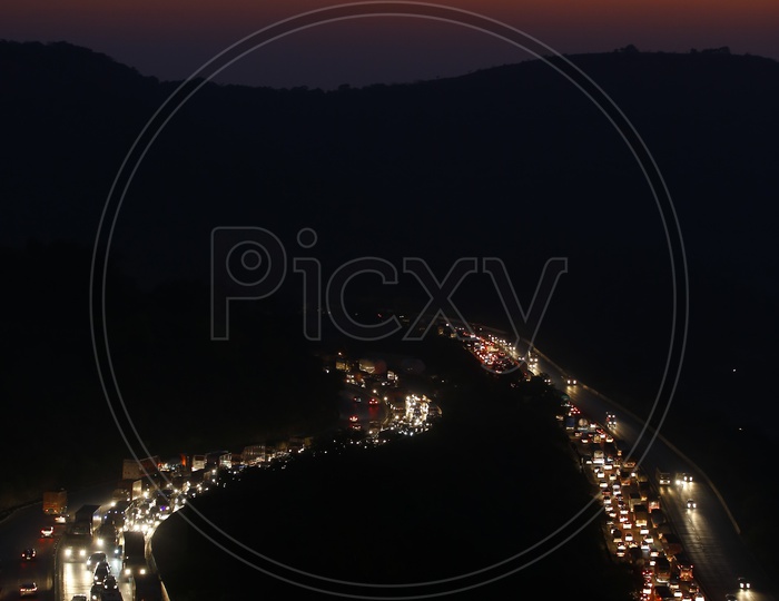 A long Exposure Shot Of a Bend In Ghat  Roads Of Lonavala at  Night Time