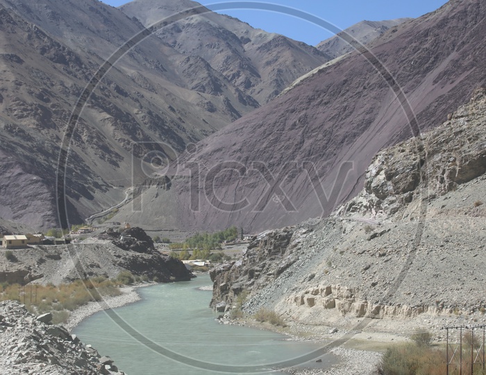 Valleys In The Leh With Water Flowing In The Valleys