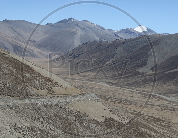 A Beautiful View Of Roads And Snow Capped Mountains in Leh