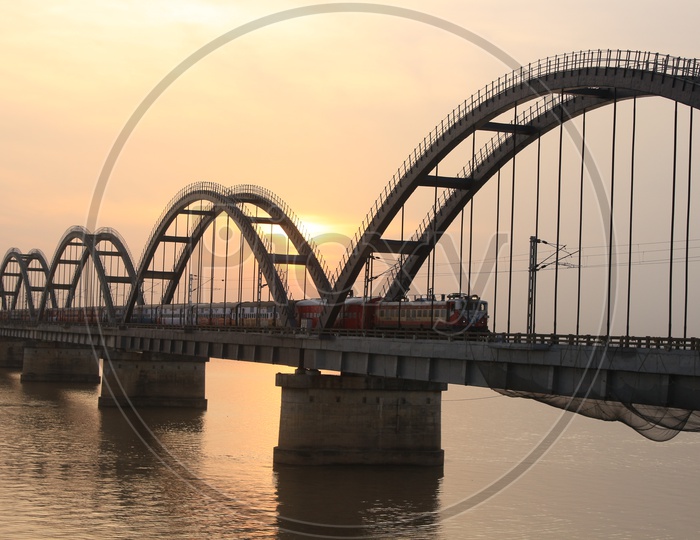 A Beautiful View Of Rajahmundry Bridge Over a Sunset