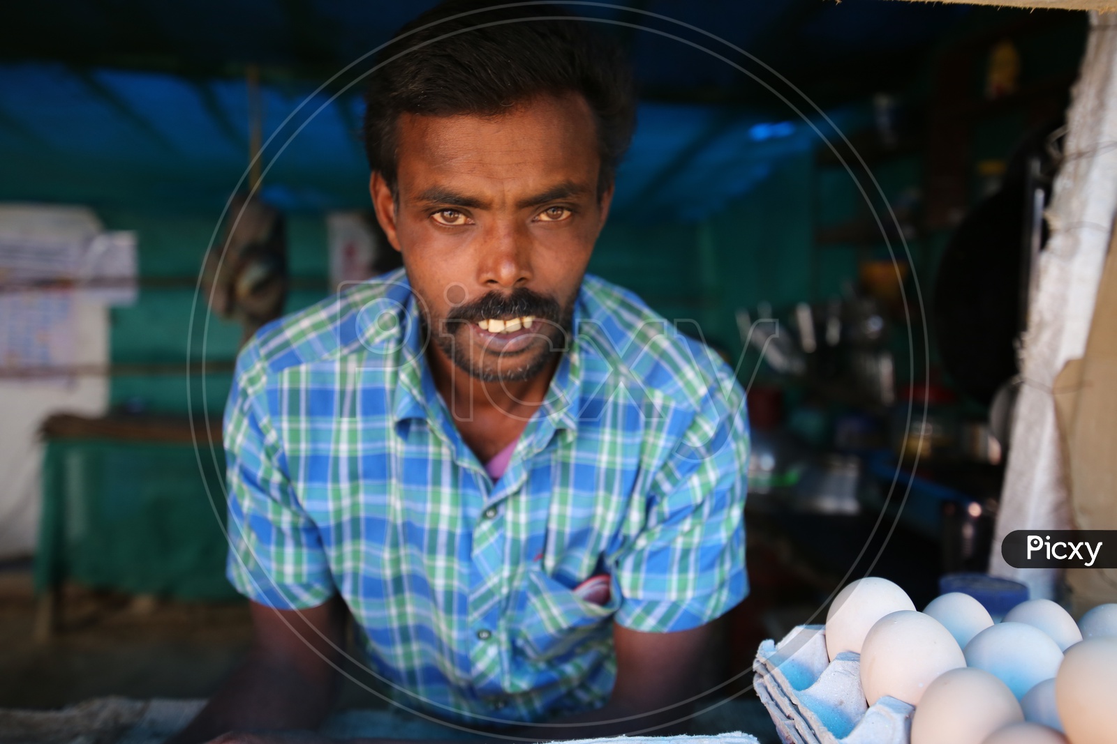 Portrait Of a Street Food Vendor In Munnar
