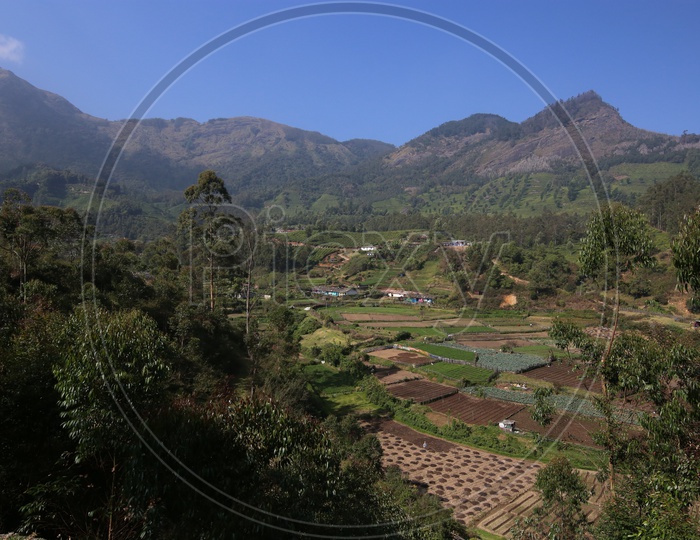 Beautiful Landscape Mountains of Munnar with Village in the foreground