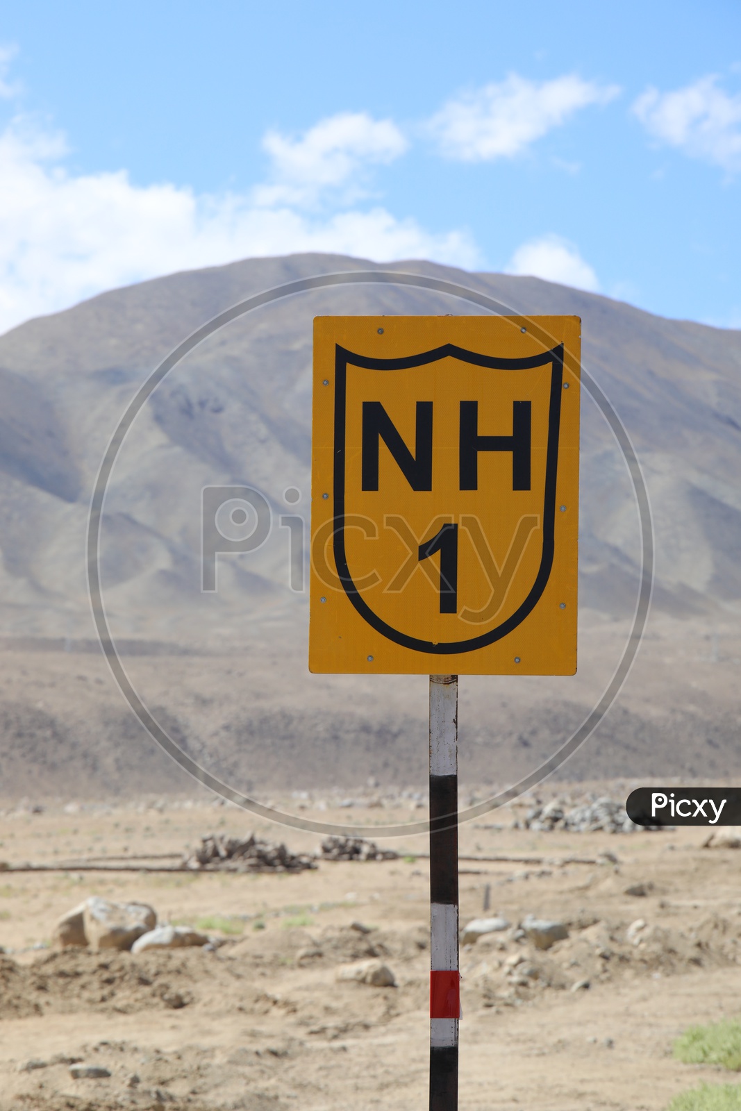 NH1 road sign board in Leh
